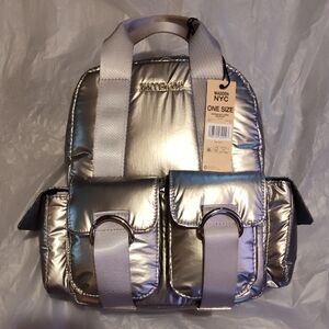 Steve Madden Silver Backpack.  Front and side pockets.